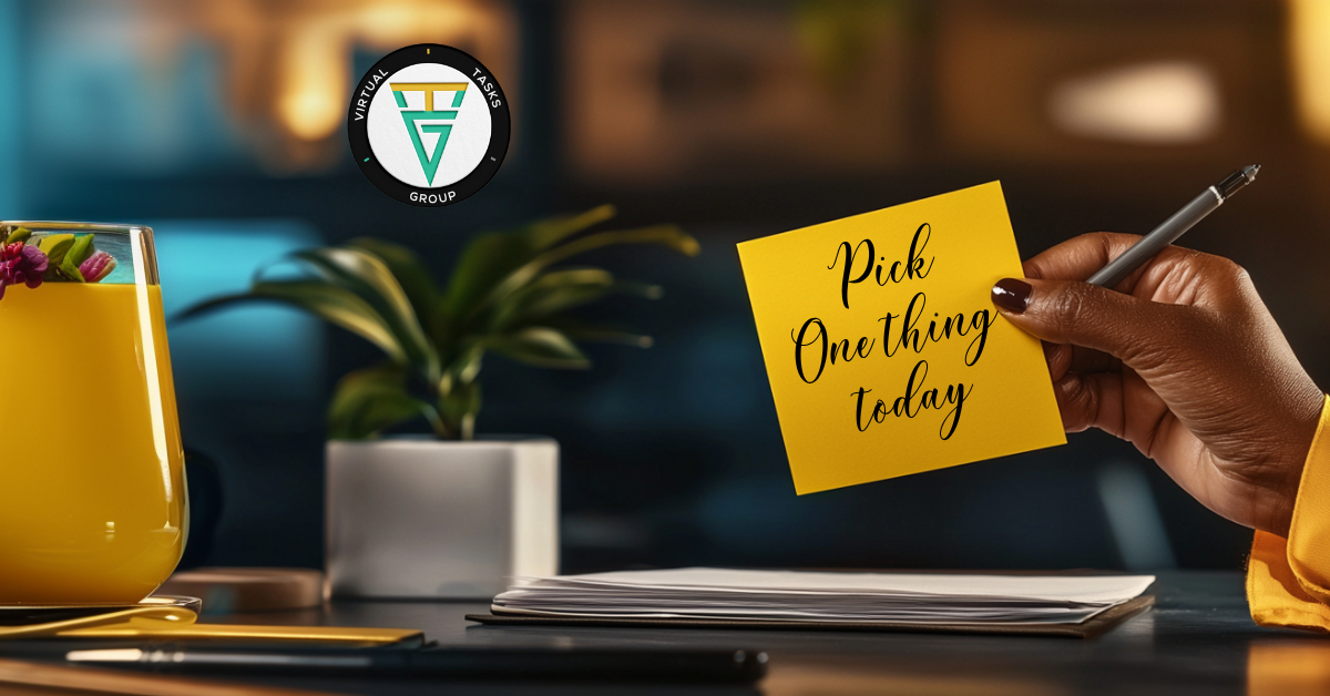 Hand holding a note that reads pick one thing today, illustrating the moment entrepreneurs say i don’t know what to do next in business and the need to choose a focused next step to regain momentum, direction, and forward movement.